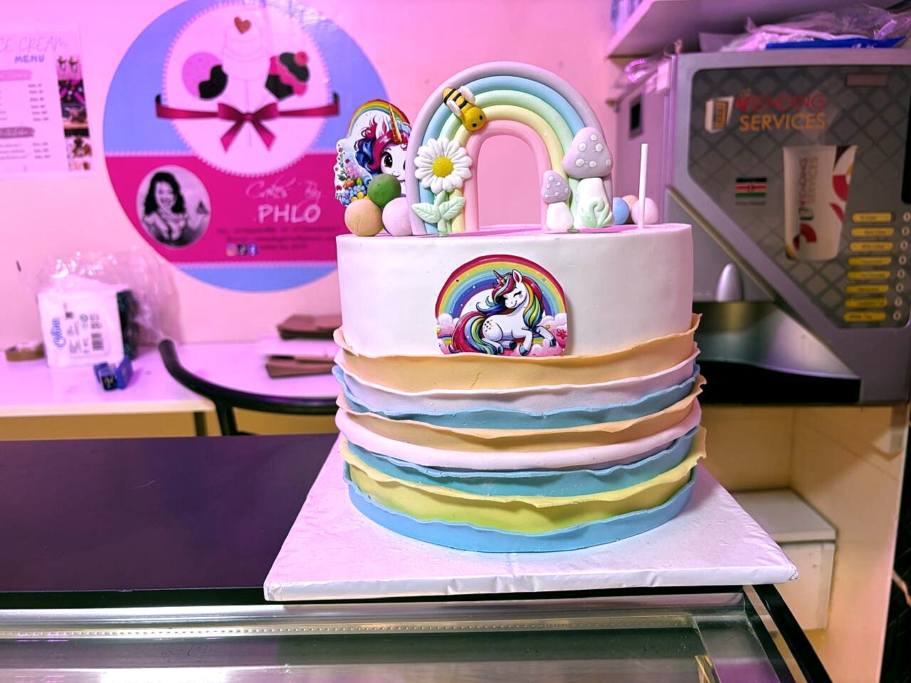 Custom unicorn rainbow birthday cake by Cakes by Phlo
